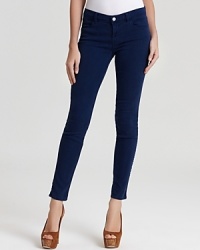 Tailored in a sleek, skinny silhouette, these J Brand jeans are fashioned in an inky hue for an elevated take on must-have denim. Tailored in a sleek, skinny silhouette, these J Brand jeans are fashioned in an inky hue for an elevated take on must-have denim.