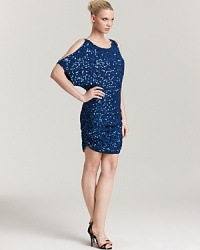 Split dolman sleeves add edge to this Aidan Mattox sequin dress, which needs nothing more than a pair of soaring metallic platforms. Split dolman sleeves add edge to this Aidan Mattox sequin dress, which needs nothing more than a pair of soaring metallic platforms.