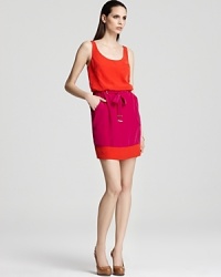 Pop-bright hues pack a punch on this Laundry by Shelli Segal color-block dress, complete with waist-cinching drawstring and comfy-chic hip pockets. Pop-bright hues pack a punch on this Laundry by Shelli Segal color-block dress, complete with waist-cinching drawstring and comfy-chic hip pockets.