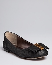 Snakeskin-embossed leather adds sophisticated sass to dainty, bow-embellished ballet flats; by Dolce Vita. Snakeskin-embossed leather adds sophisticated sass to dainty, bow-embellished ballet flats; by Dolce Vita.