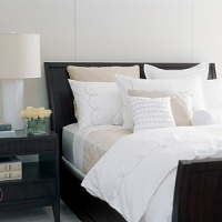 A strand of champagne oval pearls defines the beautifully detailed embroidery on this all white bed. Displaying an understated femininity, Pearls Bed can be coupled with a sensuous champagne Dream Silk coverlet. A strand of champagne oval pearls defines the beautifully detailed embroidery on this all white bed. Displaying an understated femininity, Pearls Bed can be coupled with a sensuous champagne Dream Silk coverlet.