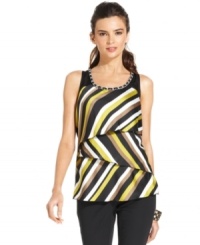 This silky top from Alfani offers up a flirty twist on the classic striped tank with its tiered silhouette and metal chain trim. Pair it with sleek black pants for a night out and add a blazer for a day in the office. This silky top from Alfani offers up a flirty twist on the classic striped tank with its tiered silhouette and metal chain trim. Pair it with sleek black pants for a night out and add a blazer for a day in the office.