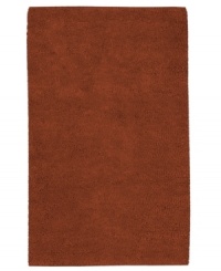 Create a luxurious foundation with a rich, felted wool rug in a deep rust hue. This plush piece features an undeniably soft hand, created with the finest hand-woven New Zealand wool. Create a luxurious foundation with a rich, felted wool rug in a deep rust hue. This plush piece features an undeniably soft hand, created with the finest hand-woven New Zealand wool.