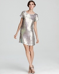 Line up your look with the gorgeous glamour of this French Connection sequin dress--striped with decadent detail and featuring the vintage-inspired silhouette of the season. Line up your look with the gorgeous glamour of this French Connection sequin dress--striped with decadent detail and featuring the vintage-inspired silhouette of the season.