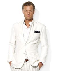 Tailored in Italy from a luxuriously lightweight cotton-linen blend, a modern three-button sport coat is emboldened with country embroidery for authentic style and time-honored tradition. Tailored in Italy from a luxuriously lightweight cotton-linen blend, a modern three-button sport coat is emboldened with country embroidery for authentic style and time-honored tradition.