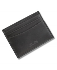 Soft lambkin adds a luxurious touch to this otherwise masculine wallet from Tasso Elba.