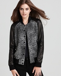 Our continued fascination with bold animal prints is clearly celebrated with Rebecca Taylor's bomber jacket-- revamped with contrast leather sleeves for an unmistakably feminine look and added edge. Our continued fascination with bold animal prints is clearly celebrated with Rebecca Taylor's bomber jacket-- revamped with contrast leather sleeves for an unmistakably feminine look and added edge.