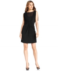 Spense's petite A-line dress features elegant ruching and a sheer neckline creating an ultra-feminine appeal. Spense's petite A-line dress features elegant ruching and a sheer neckline creating an ultra-feminine appeal.