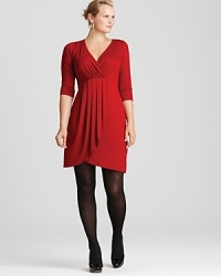 A wardrobe essential, this Karen Kane Plus dress celebrates effortless elegance with a flattering wrap silhouette inspired by intricate pleats. A wardrobe essential, this Karen Kane Plus dress celebrates effortless elegance with a flattering wrap silhouette inspired by intricate pleats.