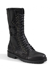 Rugged Italian leather style with a rebellious attitude, accented with graduated metal grommets, multiple laces, edgy buckles and lug soles.Italian leather upper Lace up and back zip closure Leather lining Padded insole Italian leather sole Imported Rugged Italian leather style with a rebellious attitude, accented with graduated metal grommets, multiple laces, edgy buckles and lug soles.Italian leather upper Lace up and back zip closure Leather lining Padded insole Italian leather sole Imported