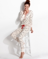 Lounge around in style. Kensie's Quite The Character pajamas feature a front placket up top and rib cuffs on the top and bottom. Lounge around in style. Kensie's Quite The Character pajamas feature a front placket up top and rib cuffs on the top and bottom.