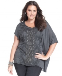Steal the spotlight in Seven7 Jeans' asymmetrical plus size top, featuring a studded snakeskin-print! Steal the spotlight in Seven7 Jeans' asymmetrical plus size top, featuring a studded snakeskin-print!