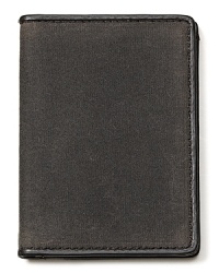 Casually handsome with a well-used retro look, this distressed cotton wallet has a leather interior stocked with slots and pockets. Casually handsome with a well-used retro look, this distressed cotton wallet has a leather interior stocked with slots and pockets.