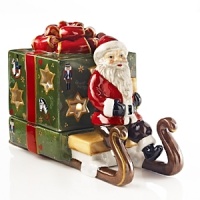 Nostalgic and sweet, this charming Santa votive is ready to make a special delivery. Nostalgic and sweet, this charming Santa votive is ready to make a special delivery.