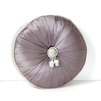 Boasting a classically opulent shape in finely pleated purple silk, this Waterford decorative pillow boasts fine twisted cord detailing and center acorn tassels. Boasting a classically opulent shape in finely pleated purple silk, this Waterford decorative pillow boasts fine twisted cord detailing and center acorn tassels.