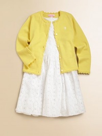 The classic cardigan gets a cheery update in a vibrant hue with scalloped trim and logo embroidery.CrewneckLong sleevesButton front with scalloped trimScalloped cuffs, hem and collarCottonMachine washImported Please note: Number of buttons may vary depending on size ordered. The classic cardigan gets a cheery update in a vibrant hue with scalloped trim and logo embroidery.CrewneckLong sleevesButton front with scalloped trimScalloped cuffs, hem and collarCottonMachine washImported Please note: Number of buttons may vary depending on size ordered.