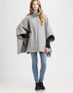 Supremely soft, cable-knit cape of pure cotton, updated by a funnelneck, front zipper and convenient slash pockets. FunnelneckFront zipperCape sleevesSlash pocketsAbout 29 from shoulder to hemCottonMachine washMade in Italy of imported fabricModel shown is 5'10 (177cm) wearing US size Small.