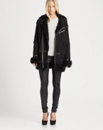 Soft, aviator-inspired leather jacket, defined by plush shearling, contrast trim and a length that hits below the hips.