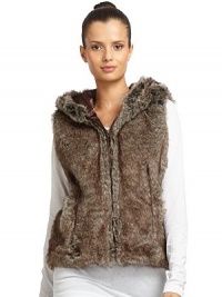 THE LOOKFaux fur designHoodFront zip closureSleevelessSide seam pocketsTHE FITAbout 23 from shoulder to hemTHE MATERIALAcrylic Fully linedCARE & ORIGINDry cleanImportedModel shown is 5'10 (177cm) wearing US size S/M. THE LOOKFaux fur designHoodFront zip closureSleevelessSide seam pocketsTHE FITAbout 23 from shoulder to hemTHE MATERIALAcrylic Fully linedCARE & ORIGINDry cleanImportedModel shown is 5'10 (177cm) wearing US size S/M.