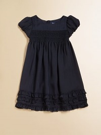 Delicate ruffles and heritage-inspired smocking accent a pretty occasion dress in luxurious silk chiffon.BoatneckShort puffed sleevesBack buttonsSmocked bodiceEmpire waistFlared skirtFully linedSilkDry cleanImported Please note: Number of buttons may vary depending on size ordered. Delicate ruffles and heritage-inspired smocking accent a pretty occasion dress in luxurious silk chiffon.BoatneckShort puffed sleevesBack buttonsSmocked bodiceEmpire waistFlared skirtFully linedSilkDry cleanImported Please note: Number of buttons may vary depending on size ordered.