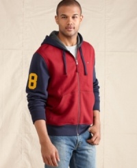 Throwback. Sport a scholastic style in this comfortable zip-up hoodie from Tommy Hilfiger. Throwback. Sport a scholastic style in this comfortable zip-up hoodie from Tommy Hilfiger.