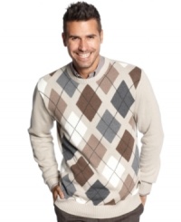 Clearly a classic. The argyle pattern of this Oscar de la Renta sweater gives your style a timeless touch. Clearly a classic. The argyle pattern of this Oscar de la Renta sweater gives your style a timeless touch.
