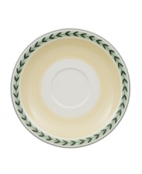 In sunny yellow porcelain with pretty vine trim, this French Garden saucer is perfectly at home on casual country tables. In sunny yellow porcelain with pretty vine trim, this French Garden saucer is perfectly at home on casual country tables.