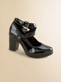 Gleaming patent in a classic pump with a crisscross ankle strap and a chunky heel.Faux leather upperBuckle ankle strapLightweight heelMicrosuede liningPadded insoleRubber composite soleImported Gleaming patent in a classic pump with a crisscross ankle strap and a chunky heel.Faux leather upperBuckle ankle strapLightweight heelMicrosuede liningPadded insoleRubber composite soleImported