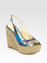 Classic espadrille wedge and platform with an exotic python upper and adjustable slingback strap. Hemp wedge, 5 (125mm)Hemp platform, 1½ (40mm)Compares to a 3½ heel (90mm)Python upperLeather lining and solePadded insoleMade in ItalyOUR FIT MODEL RECOMMENDS ordering one half size up as this style runs small. Classic espadrille wedge and platform with an exotic python upper and adjustable slingback strap. Hemp wedge, 5 (125mm)Hemp platform, 1½ (40mm)Compares to a 3½ heel (90mm)Python upperLeather lining and solePadded insoleMade in ItalyOUR FIT MODEL RECOMMENDS ordering one half size up as this style runs small.