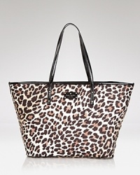 This perennially polished kate spade new york carryall gets a major dose of the label's whimsical style, crafted of nylon with glossy leather trims. This perennially polished kate spade new york carryall gets a major dose of the label's whimsical style, crafted of nylon with glossy leather trims.