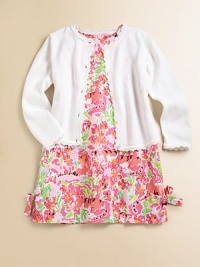 A vivid floral design with perfectly placed pockets and sweet side bows take this shift from traditional to fabulous.JewelneckSleevelessBack zipperFront patch pocketsHem ventsFully linedCottonMachine washImported A vivid floral design with perfectly placed pockets and sweet side bows take this shift from traditional to fabulous.JewelneckSleevelessBack zipperFront patch pocketsHem ventsFully linedCottonMachine washImported