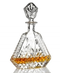 The sparkling sophistication of yesteryear makes a chic comeback with this triangular wine decanter, featuring the intricate starburst pattern of Godinger's popular Dublin crystal serveware collection. The sparkling sophistication of yesteryear makes a chic comeback with this triangular wine decanter, featuring the intricate starburst pattern of Godinger's popular Dublin crystal serveware collection.