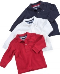Polo champion. This Long-sleeved Tommy Hilfiger favorite is a must-have for any collar-worthy occasion. Polo champion. This Long-sleeved Tommy Hilfiger favorite is a must-have for any collar-worthy occasion.