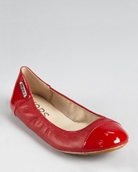 Trimmed in patent at both ends, the KORS Michael Kors Erin flex ballet flats are a sleek choice for the modern woman on the move. Trimmed in patent at both ends, the KORS Michael Kors Erin flex ballet flats are a sleek choice for the modern woman on the move.