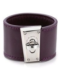 Pop and turnlock it with this tough-chic leather bracelet from MARC BY MARC JACOBS. The bold brass hardware lends this chunky showpiece serious edge. Pop and turnlock it with this tough-chic leather bracelet from MARC BY MARC JACOBS. The bold brass hardware lends this chunky showpiece serious edge.