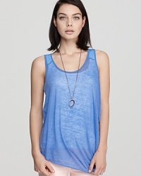 The rag & bone/JEAN Hanna tank proves sheer is chic--and that the asymmetric trend is here to stay. This saturated look is high on style and cool with everything from cheeky shorts to a flowing maxi skirt. The rag & bone/JEAN Hanna tank proves sheer is chic--and that the asymmetric trend is here to stay. This saturated look is high on style and cool with everything from cheeky shorts to a flowing maxi skirt.