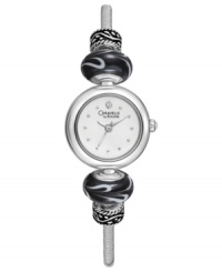 Moody black beads and crystal shimmer make this bangle watch from Caravelle by Bulova an intriguing addition to your collection. Moody black beads and crystal shimmer make this bangle watch from Caravelle by Bulova an intriguing addition to your collection.