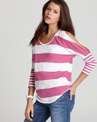 Cutout shoulders lend interest and a peek of skin on this brightly striped C&C California three-quarter sleeve tee. Cutout shoulders lend interest and a peek of skin on this brightly striped C&C California three-quarter sleeve tee.