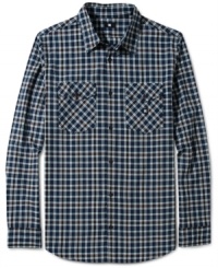 Add checks to your wardrobe and you'll get checked out with style in this shirt by DC Shoes. Add checks to your wardrobe and you'll get checked out with style in this shirt by DC Shoes.