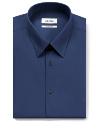 This no-iron, slim-fit Calvin Klein dress shirt will be your go-to when you need crisp style in a snap. This no-iron, slim-fit Calvin Klein dress shirt will be your go-to when you need crisp style in a snap.