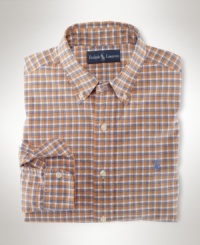 A handsome classic-fitting sport shirt is tailored for comfortable style from smooth oxford-woven cotton with a heritage gingham design. A handsome classic-fitting sport shirt is tailored for comfortable style from smooth oxford-woven cotton with a heritage gingham design.