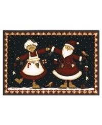 The jolliest Mr. and Mrs. show off their decorating skills in this Shaw Living area rug, lending a cheerful holiday statement to your floor. Woven in the USA of recyclable nylon. The jolliest Mr. and Mrs. show off their decorating skills in this Shaw Living area rug, lending a cheerful holiday statement to your floor. Woven in the USA of recyclable nylon.