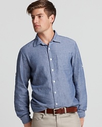 Soft chambray crafted into a classic fit Michael Kors shirt, featuring roll and tab sleeves. Soft chambray crafted into a classic fit Michael Kors shirt, featuring roll and tab sleeves.