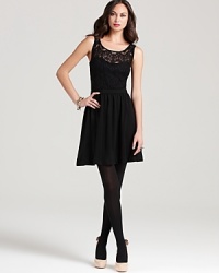 Lend a little drama to your LBD portfolio as sheer black lace imbues an effortless Lilly Pulitzer dress with dark romance. Lend a little drama to your LBD portfolio as sheer black lace imbues an effortless Lilly Pulitzer dress with dark romance.