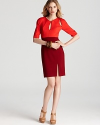 Smart cutouts show off a subtle flash of skin on Black Halo's two-tone, trend-right Anthony dress. Smart cutouts show off a subtle flash of skin on Black Halo's two-tone, trend-right Anthony dress.