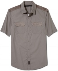 Sleek styling with a utilitarian vibe. This Sean John shirt masters minimalism in your wardrobe. Sleek styling with a utilitarian vibe. This Sean John shirt masters minimalism in your wardrobe.