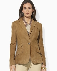 Supple suede creates the silhouette of a sleek one-button jacket, crafted with classic styling details for a modern take on a timeless piece. Supple suede creates the silhouette of a sleek one-button jacket, crafted with classic styling details for a modern take on a timeless piece.