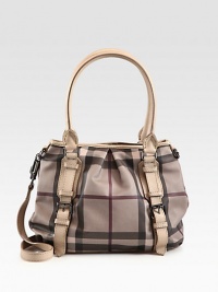 Ultra-smooth leather trim frames this top-handle shape perfectly, featuring the signature Burberry check on PVC. Double leather top handles, 8 dropAdjustable detachable leather shoulder strap, 18¼-20 dropMagnetic snap closureOne inner zip compartmentThree inside zip pocketsCotton lining12W X 10H X 4¾DImported Ultra-smooth leather trim frames this top-handle shape perfectly, featuring the signature Burberry check on PVC. Double leather top handles, 8 dropAdjustable detachable leather shoulder strap, 18¼-20 dropMagnetic snap closureOne inner zip compartmentThree inside zip pocketsCotton lining12W X 10H X 4¾DImported
