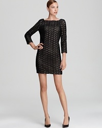 Articulated in lovely lace, this DIANE von FURSTENBERG dress is a romantic choice for after-dark style. Articulated in lovely lace, this DIANE von FURSTENBERG dress is a romantic choice for after-dark style.