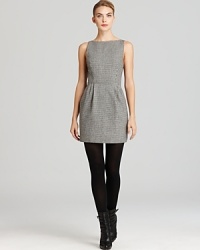 This elegant Alice + Olivia dress features subtle pleats for added definition in a timeless houndstooth print synonymous withclassic style. This elegant Alice + Olivia dress features subtle pleats for added definition in a timeless houndstooth print synonymous withclassic style.